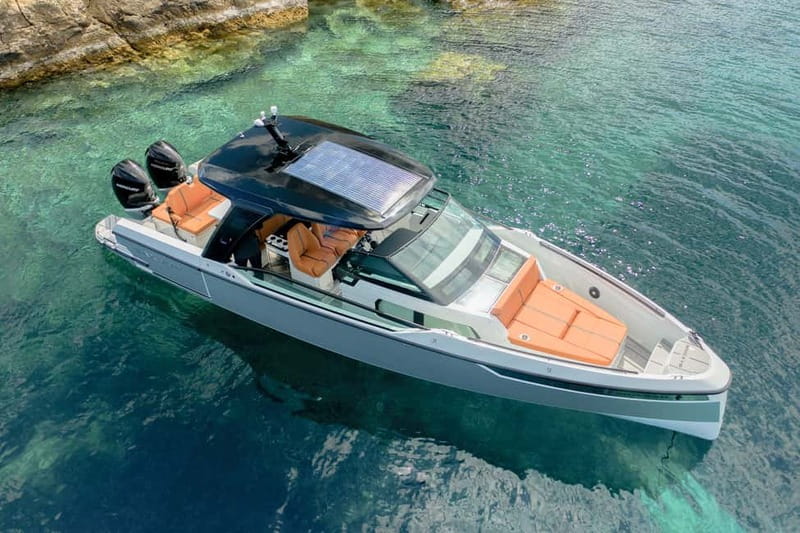 Adamantas: Speedboat Day Trip with Snorkel, Meals & Open Bar - Leaving Adamantas with breakfast onboard