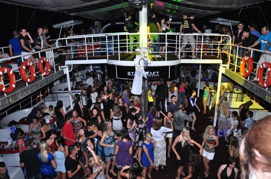 Alanya: Disco Boat Tour with Foam Party and Unlimited Drinks - Caves, coves, beaches, and Mediterranean swim stops