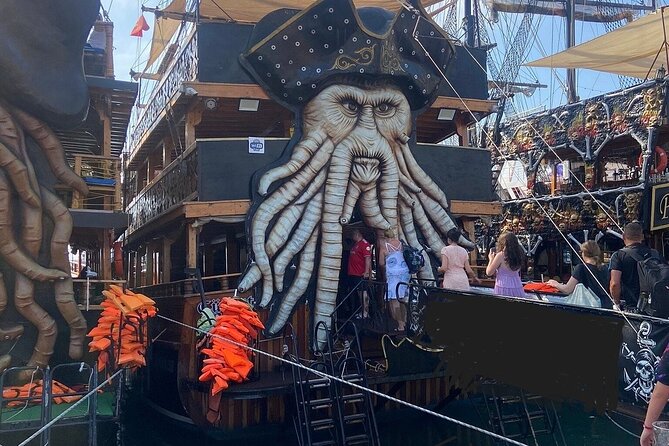 Alanya Pirate Boat Tour with Foam Party Soft Drinks & Transfer - Caves, cliffs, and the first swim