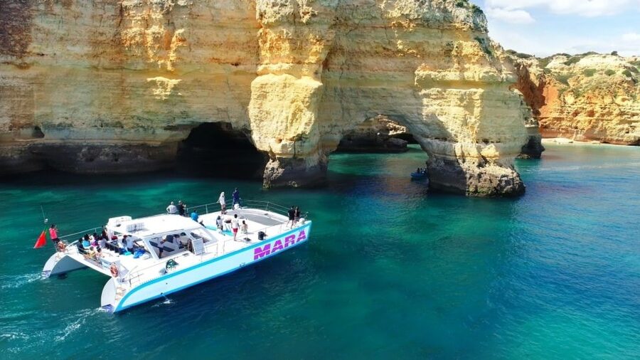 Albufeira: Catamaran Cruise with BBQ & Open Bar on the Beach - Sailing west from Albufeira Marina