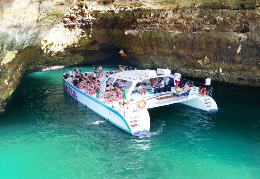 Albufeira: Catamaran Cruise with BBQ & Open Bar on the Beach - Swimming, sun, and the wet transfer