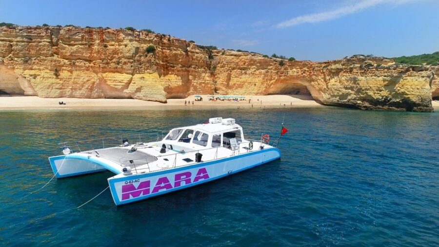 Albufeira: Catamaran Cruise with BBQ & Open Bar on the Beach - Getting close to Benagil and the coastal caves