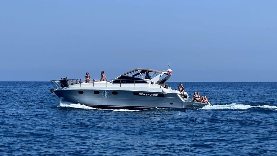 Amalfi: Amalfi Coast and Positano Sunset Cruise with Drinks - Furore and the famous coastal bridge
