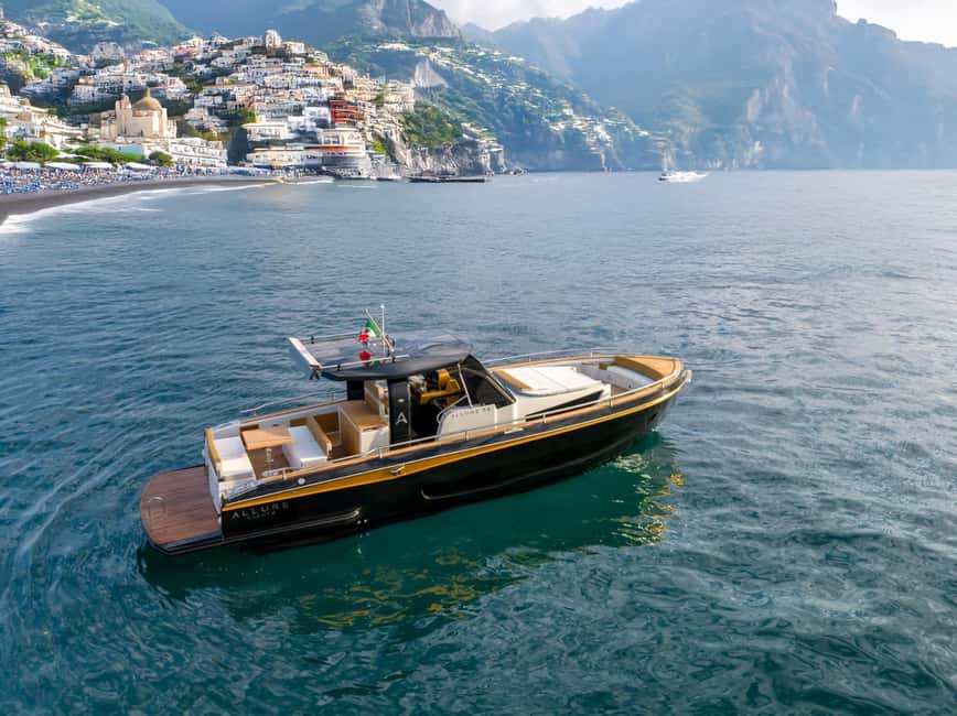 Amalfi Coast: Romantic Sunset Cruise with Music & Cocktails - Local snacks, paninis, and the open bar