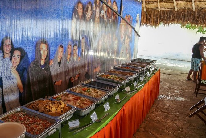 Amazing tour to the beauty Isla Mujeres with Snorkel and open bar - Isla Mujeres, beach-club time, and downtown access