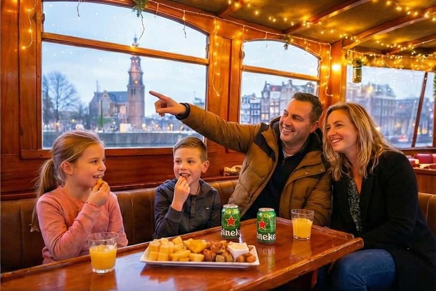 Amsterdam: 90 min Cruise with Local Guide & Unlimited Drinks - Oude Kerk and the older side of Amsterdam