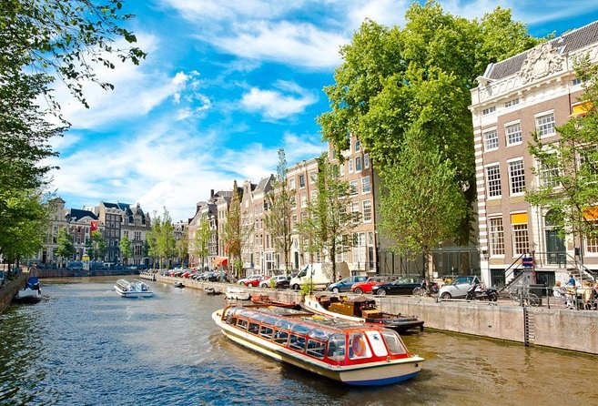 Amsterdam: Canal Booze Cruise with Unlimited Drinks Option - A one-hour introduction to Amsterdam by boat