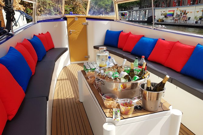 Amsterdam: Canal Booze Cruise with Unlimited Drinks Option - The Skinny Bridge and the Amstel River