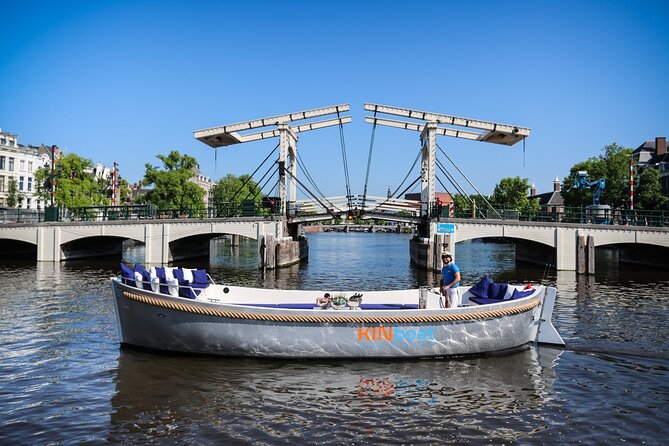 Amsterdam Canal Cruise in Open Boat with Unlimited Drinks Option - Sightseeing and photo moments along the canal belt