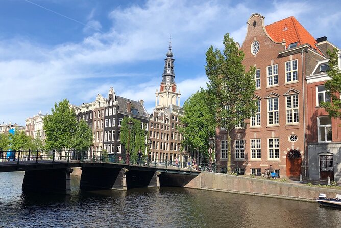 Amsterdam Canal Cruise with German Guide and unlimited drinks - Starting at Amsterdam’s old harbour