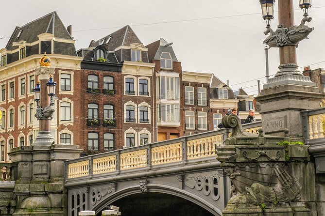 Amsterdam Canal Cruise with German Guide and unlimited drinks - The Hermitage area and the Cointower