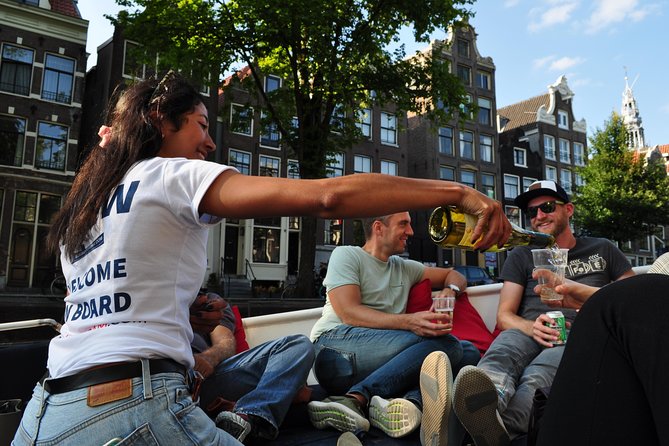 Amsterdam Canal Cruise With Live Guide and Unlimited Drinks - The Amstel, opera house, and Red Light District