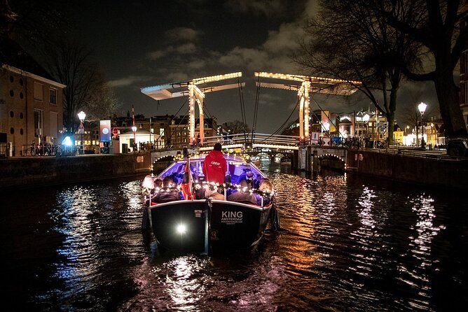 Amsterdam Canal Cruise With Live Guide and Unlimited Drinks - Eastern harbor sights and the Maritime Museum