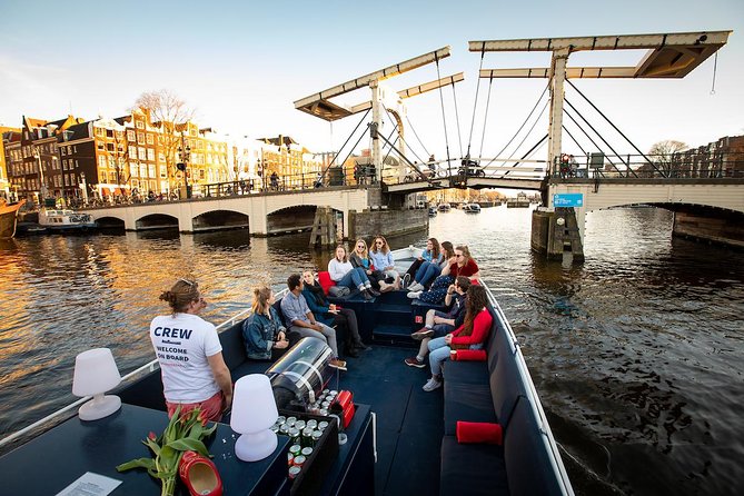 Amsterdam Canal Cruise With Live Guide and Unlimited Drinks - The drinks are part of the experience