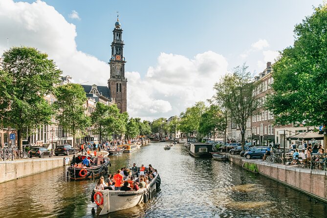 Amsterdam Classic Saloon Boat Canal Cruise with Live Guide - The Southern Church and the Stopera