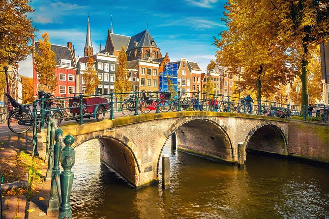 Amsterdam Classic Saloon Boat Cruise with Drinks and Cheese - The Rijksmuseum, flower market, and central canals