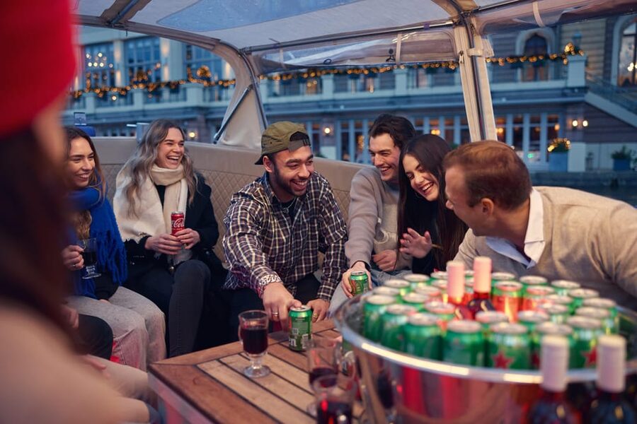 Amsterdam: Covered Canal Booze Cruise with Unlimited Drinks - Oudeschans and the central canal ride