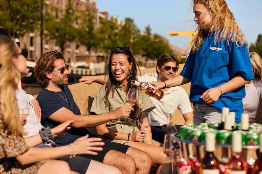 Amsterdam: Cozy Evening Canal Cruise With Open Bar Option - Starting near Dam Square and the Red Light District