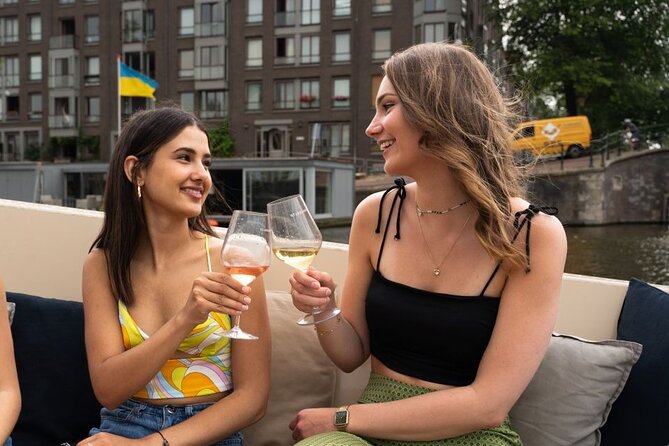 Amsterdam: Evening Candle Light Cruise With Wine & Cheese - Waterlooplein, Jewish Amsterdam, and the Stopera