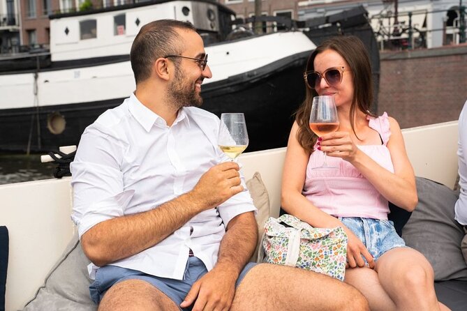 Amsterdam: Evening Candle Light Cruise With Wine & Cheese - The Dancing Houses on Damrak