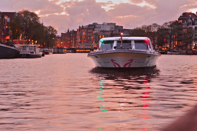 Amsterdam Evening Cocktail Cruise with snacks - Starting at Damrak 16 near the city center