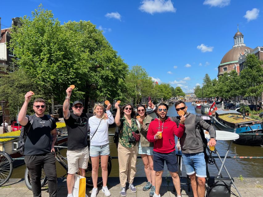 Amsterdam: Food Tour with Drinks by Spui, Canals and Jordaan - Local snacks before the canal belt
