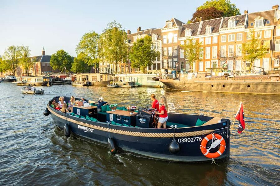 Amsterdam: Guided Open Boat Cruise Unlimited Drinks Option - The Nine Streets, Westerkerk, and Anne Frank House