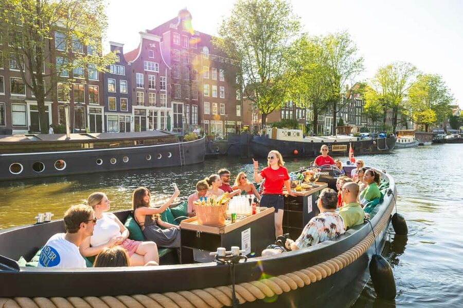 Amsterdam: Guided Open Boat Cruise Unlimited Drinks Option - From Sea Palace to the Old Harbor