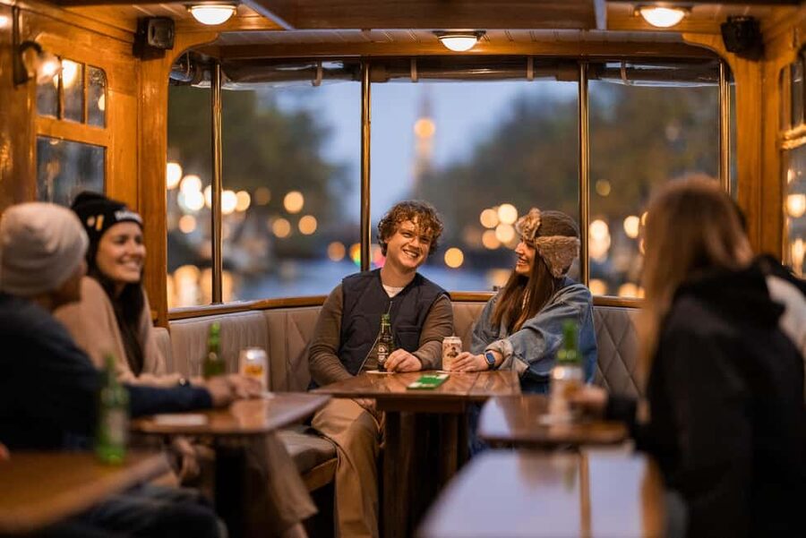 Amsterdam: Heated Canal Cruise with Unlimited Drinks & Bite - The guide matters more than the boat