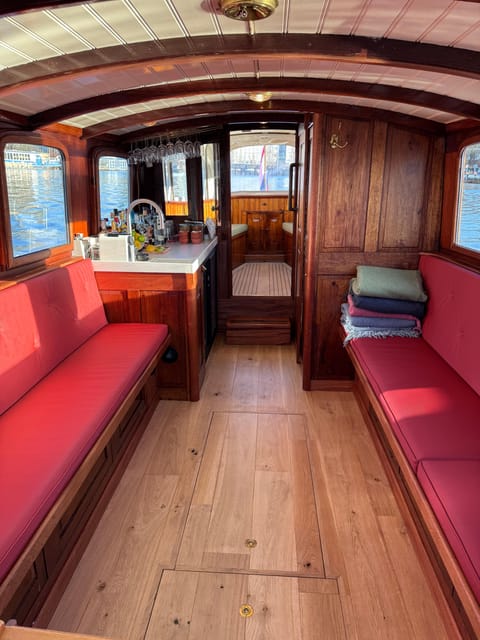Amsterdam: Historic Boat Cruise with open bar and nibbles - A 1911 boat with room to settle in