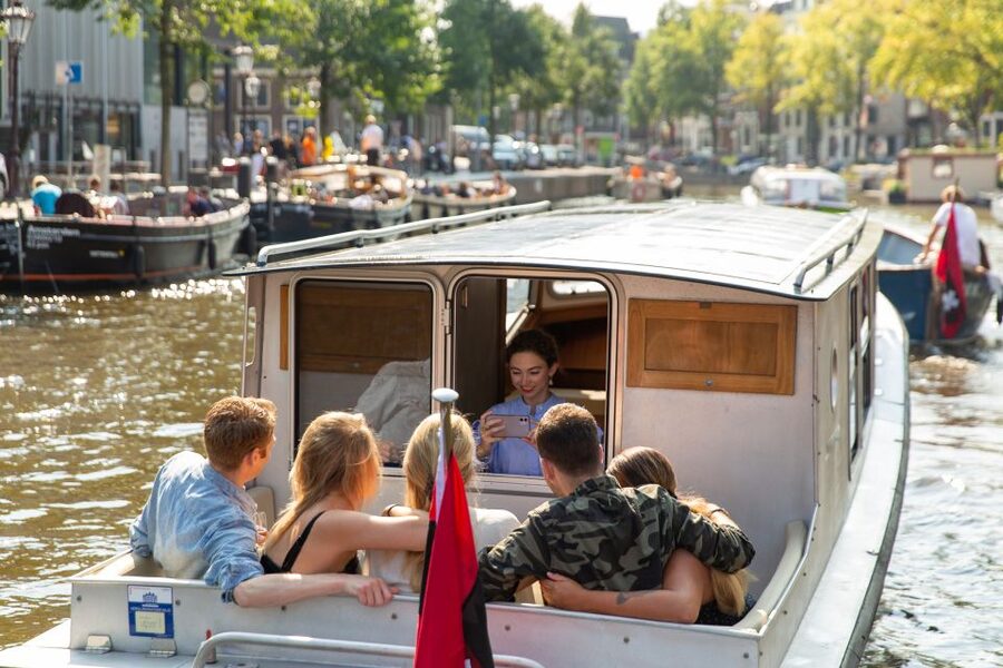 Amsterdam: Historic Boat Cruise with open bar and nibbles - Leaving from the Singel near Hotel Canalview