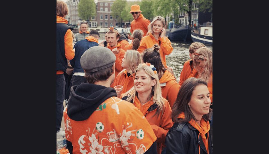 Amsterdam: King's Day Party Cruise with Open Bar & Music - Unlimited drinks, music, and the party mood