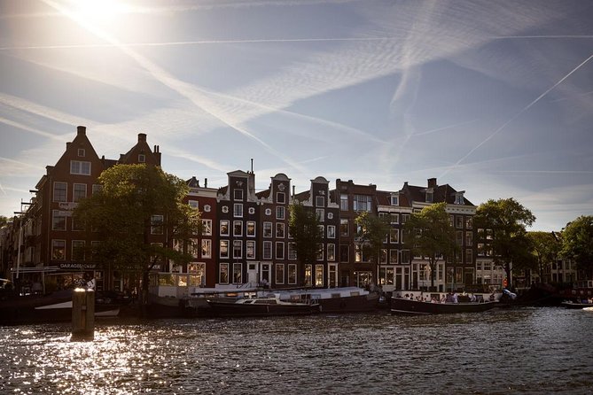 Amsterdam Light Festival: Saloon Boat Cruise + Hot Drinks & Bite - Covered does not always mean warm
