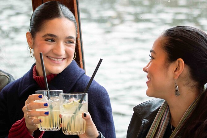 Amsterdam: Luxury Saloon Boat Cruise with Cocktails & Waffle - Maritime Amsterdam along the waterfront