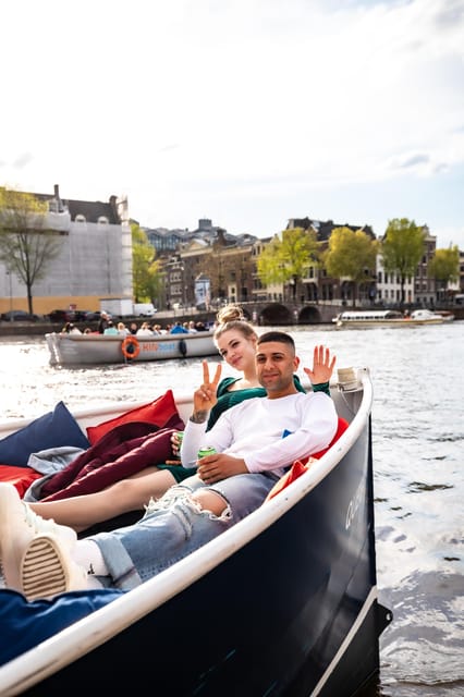 Amsterdam:Old City Canal Cruise with Live Guide and Open Bar - Canal houses, houseboats, and Amsterdam’s floating life