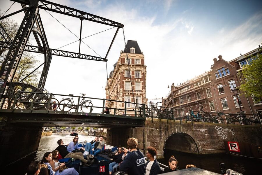 Amsterdam:Old City Canal Cruise with Live Guide and Open Bar - The Jordaan, Westerkerk, and Anne Frank House from the water