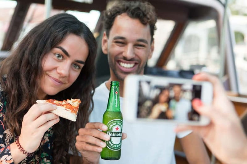 Amsterdam: Original Pizza Dinner Cruise + Unlimited Drinks - Seating, weather, and finding the pier