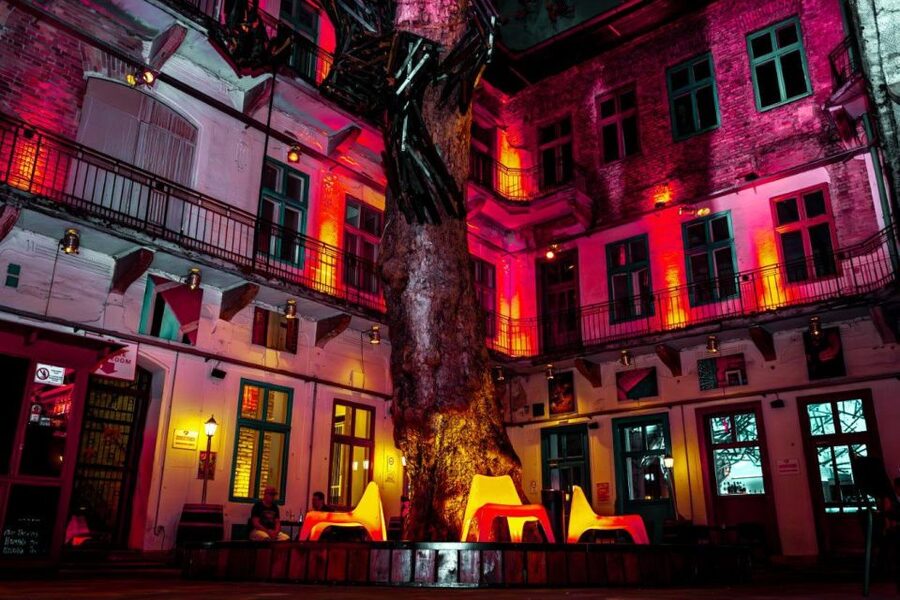Amsterdam: Original Pub Crawl Party with VIP Entrance - Moving through Amsterdam after dark