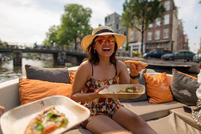 Amsterdam Private Boat Trip with Pizza and Unlimited Drinks - The sights you pass in 90 minutes