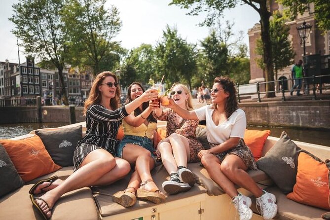 Amsterdam Private Boat Trip with Pizza and Unlimited Drinks - Pizza, wine, beer, and soft drinks onboard