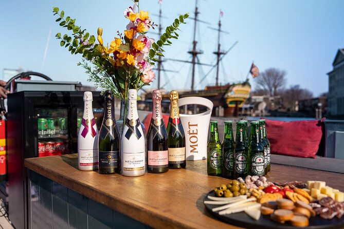 Amsterdam: Private Canal Cruise with Drinks and Snacks - Canal homes, houseboats, and Amsterdam’s expensive addresses
