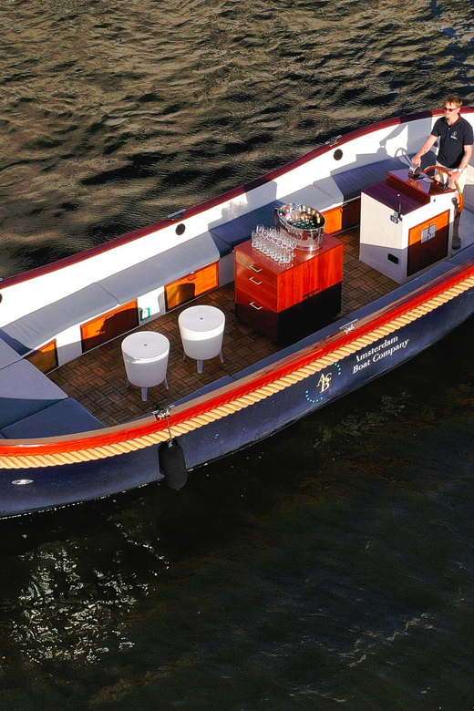 Amsterdam: Private City Canal Cruise With Unlimited Drinks - A quiet look at Amsterdam from the water