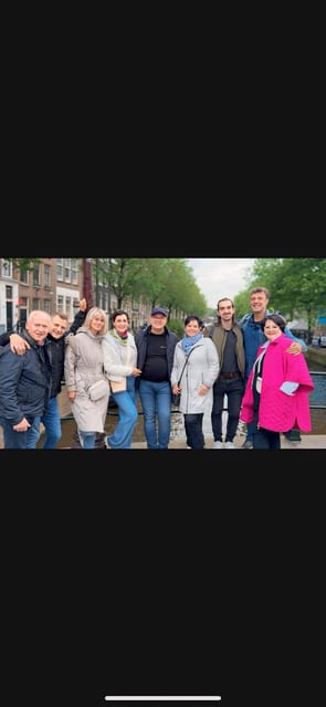 Amsterdam: Red Light Tour with Bar Visit + Free Drink and Stop at a Coffee Shop - Chinatown and the first 30 minutes