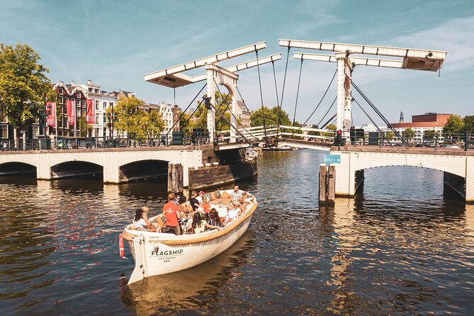 Amsterdam: Saloon Boat Cruise + Unlimited Drinks & Bite option - Beginning on the Amstel