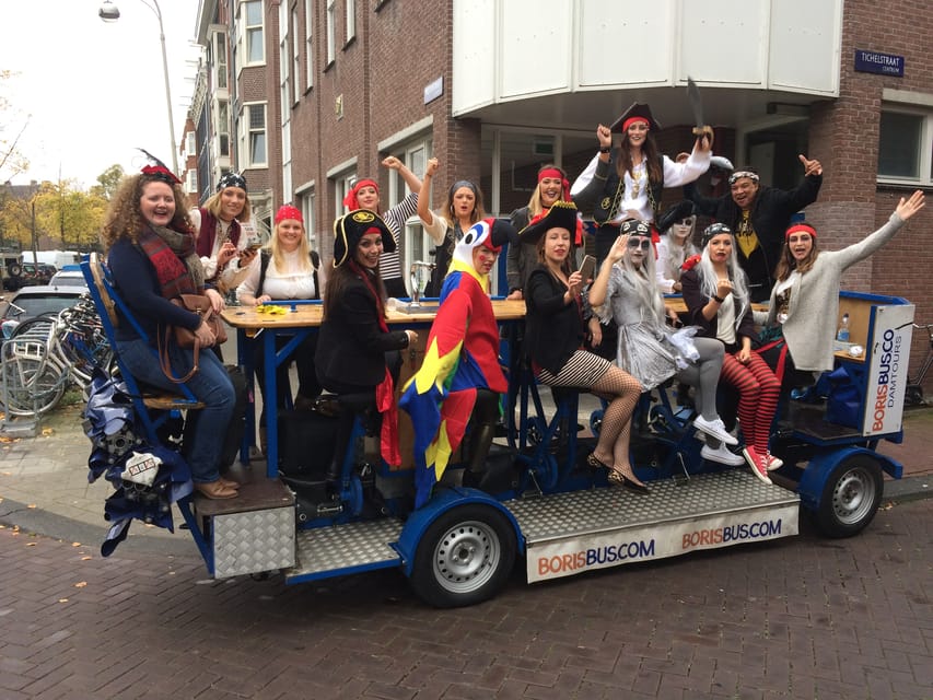 Amsterdam: Shared Party Bike Tour with Beer - Languages and the guide’s role
