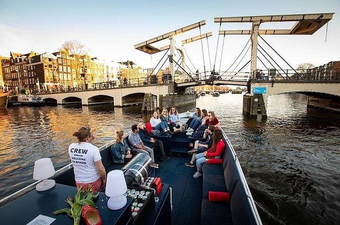Amsterdam Sunset Canal Cruise with Live Guide and Open Bar - Booking, weather, and cancellation advice