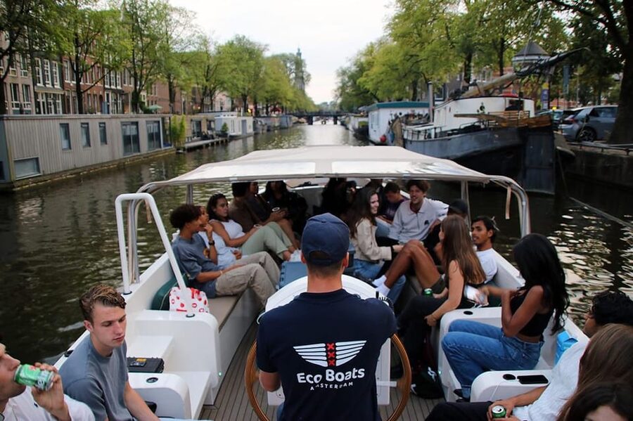 Amsterdam: The Newest Canal Cruise with Drink Option - The first sights: Basilica, Sea Palace, and old defenses