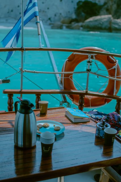 Argostoli: Full-Day Boat Trip with Lunch & Wine - Xi Beach and the Kefalonian clay stop