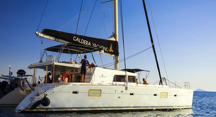 Athens: Private Catamaran Cruise w/ BBQ, Open Bar & Transfer - Sailing past Alimos, Glyfada, and Voula