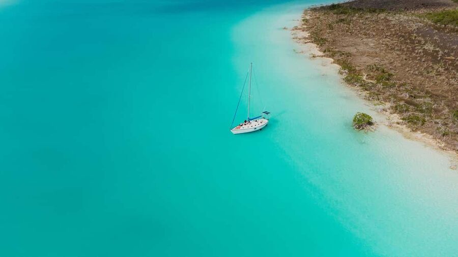Bacalar Lagoon Sailing Tour with Open Bar and Mexican Lunch - Swimming in clear turquoise water